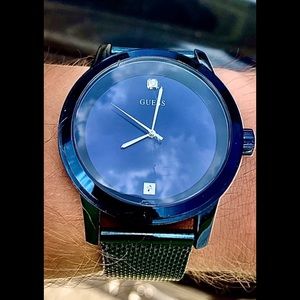 Diamond embedded, Sterling Silver GUESS watch.